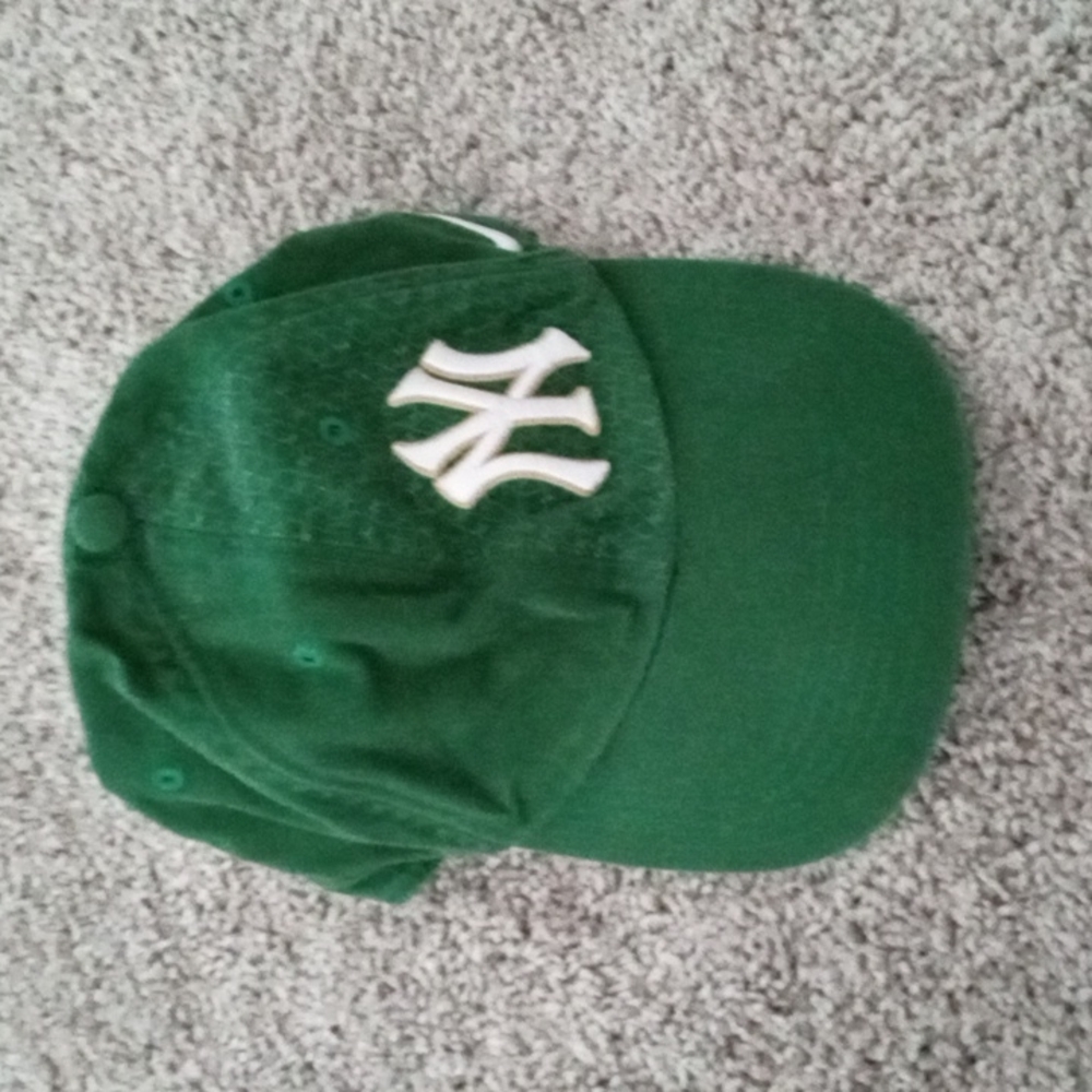 Nike NY ball cap.